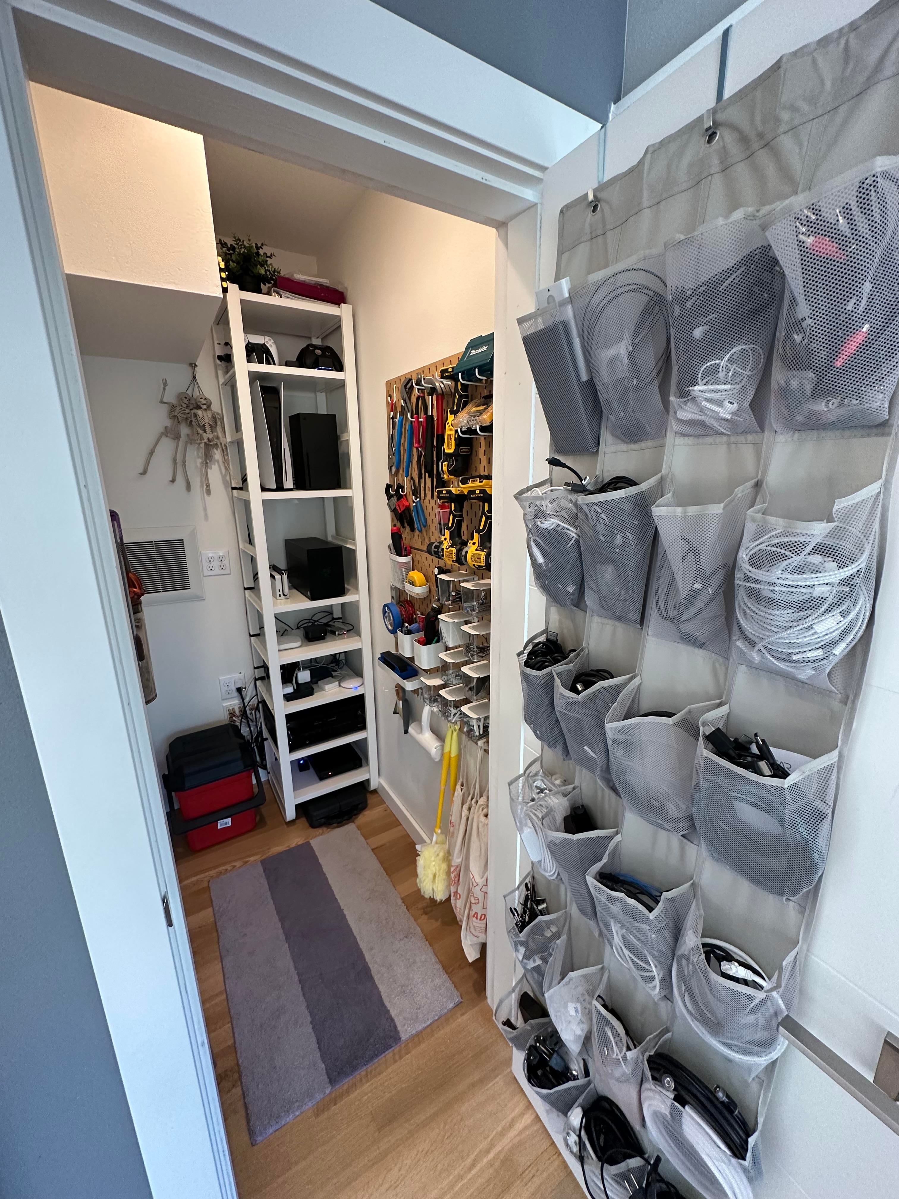 View of tools peg board (IKEA) and spare cable storage (shoe organizer from Amazon)