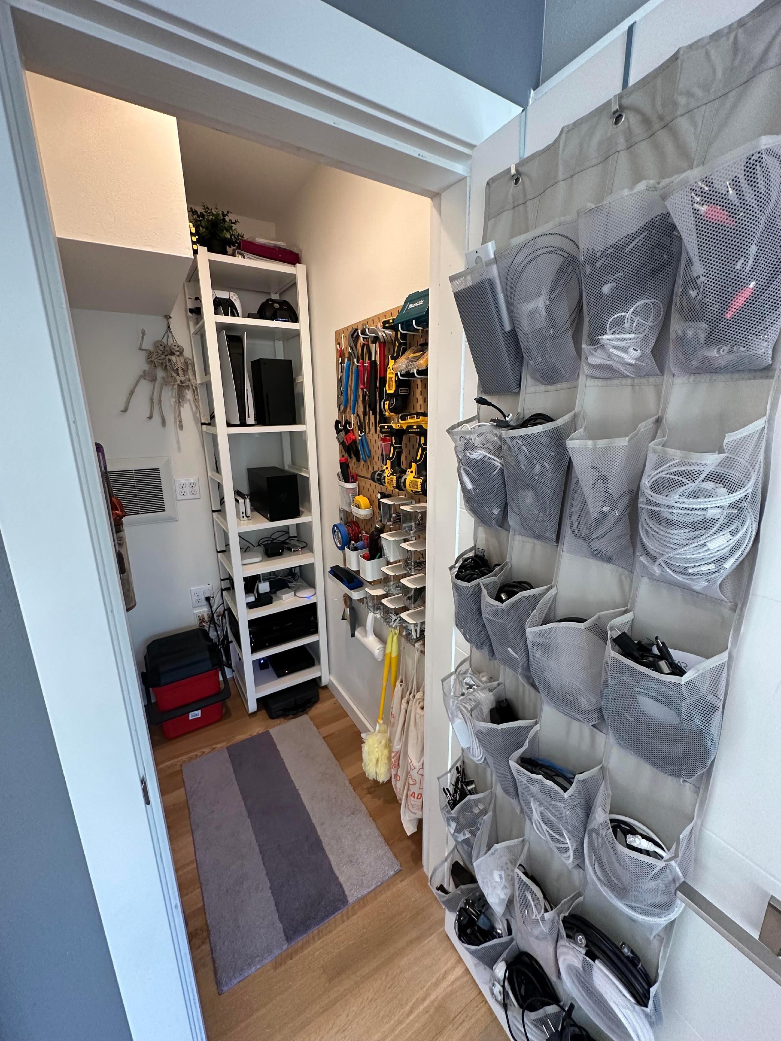 View of tools peg board (IKEA) and spare cable storage (shoe organizer from Amazon)
